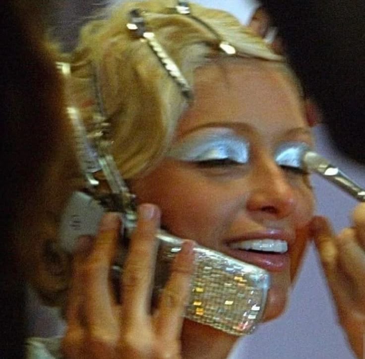 Paris Hilton with a blinged cell phone